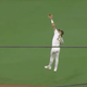 San Diego Padres player Fernando Tatis, Jr. leaping to catch a baseball.